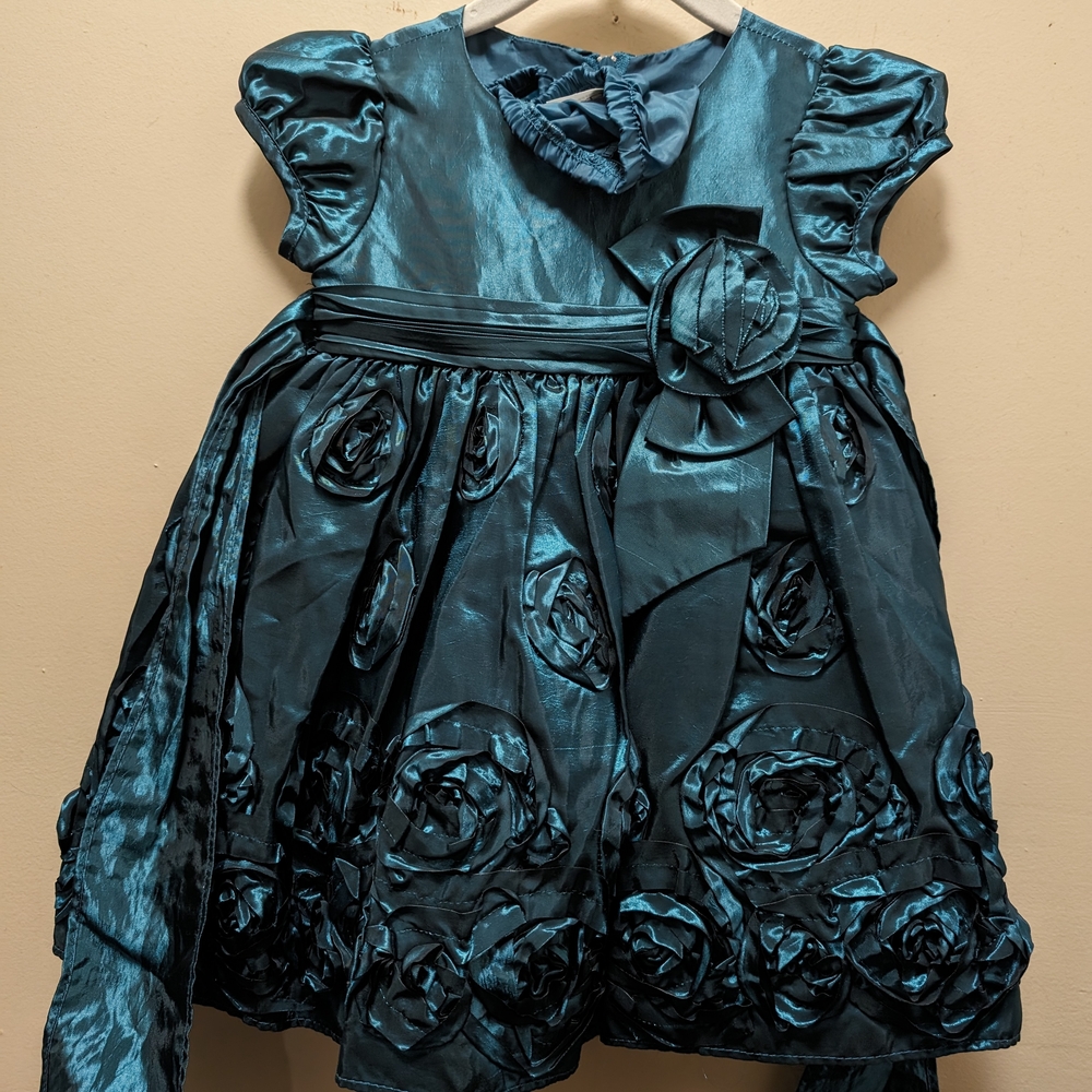 Elegant Teal Dress with Rosette Details
